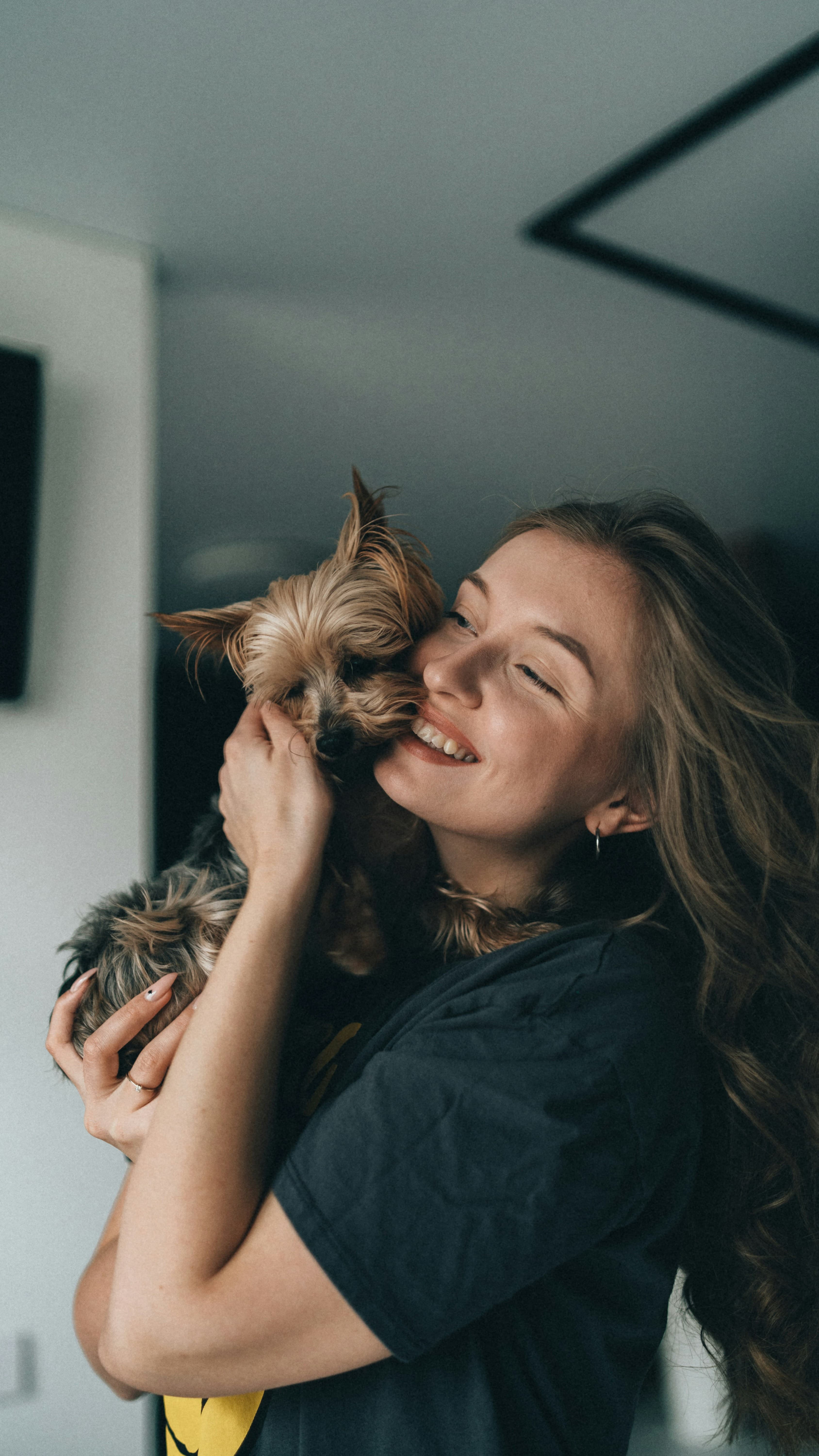 Maria C. holding her Yorkie puppy Oliver